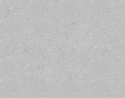 A close-up view of a fine-grained, light grey textured surface resembling concrete or stone.